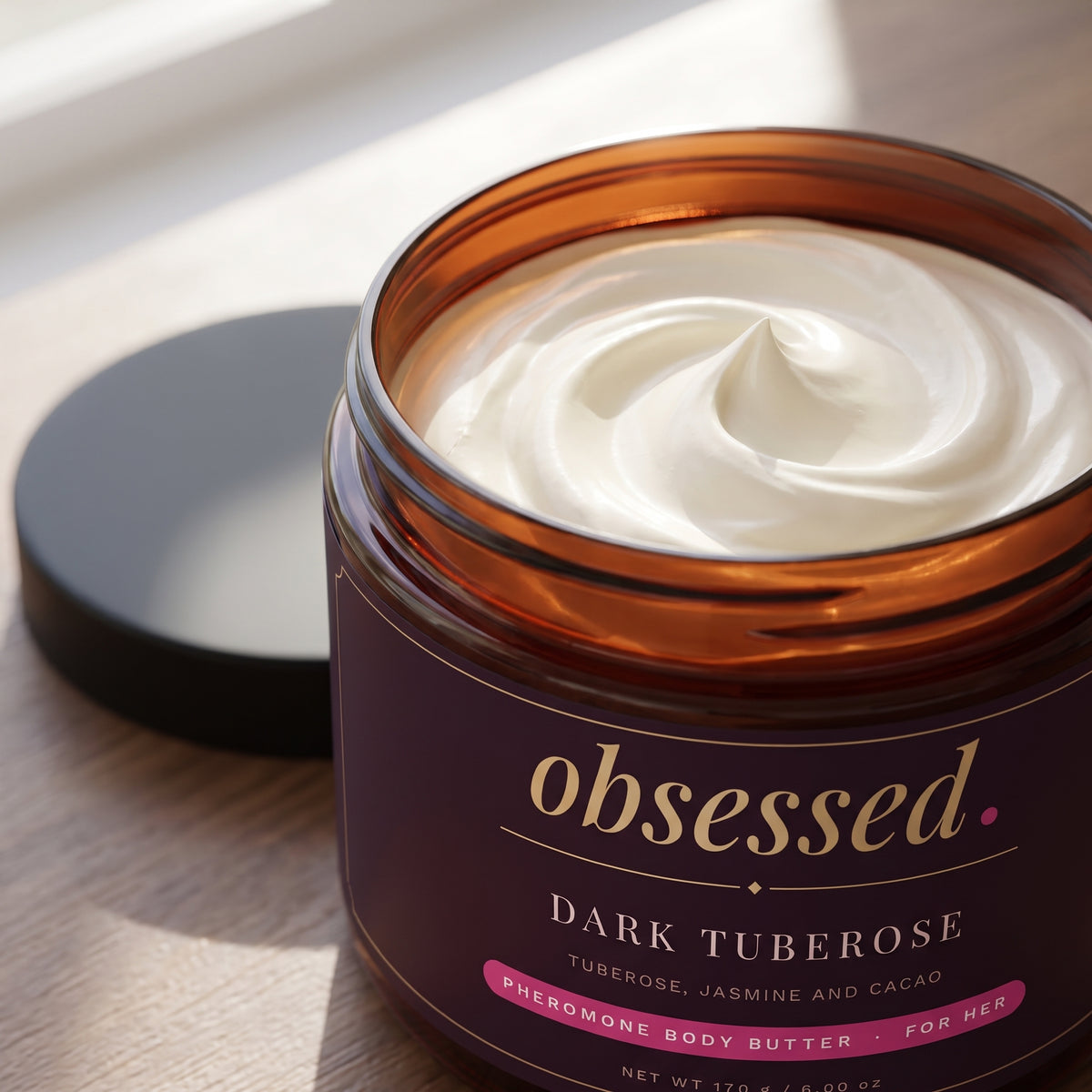 Close view of whipped Dark Tuberose body butter in the open jar