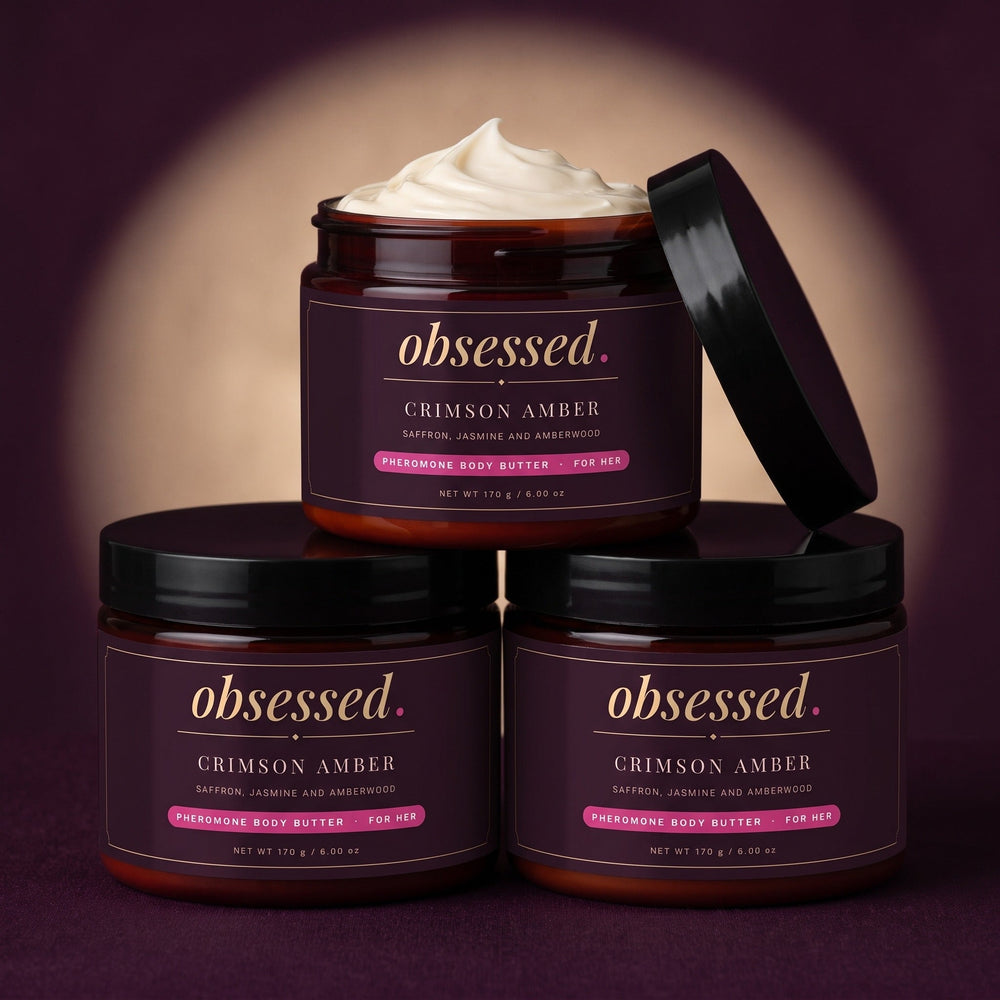 Three jars of Obsessed pheromone body butter, one open showing the whipped butter